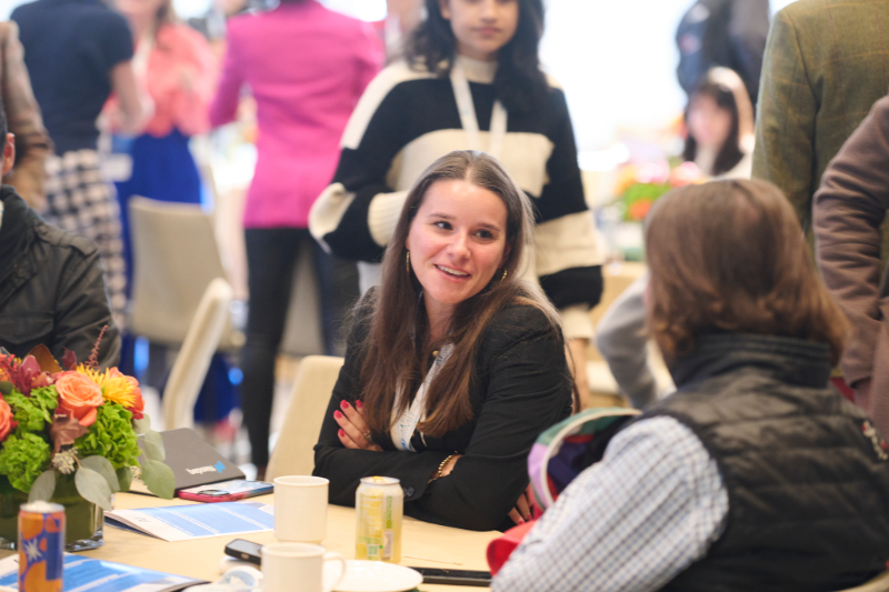 Two women talking at BIG AI at MIT 2024