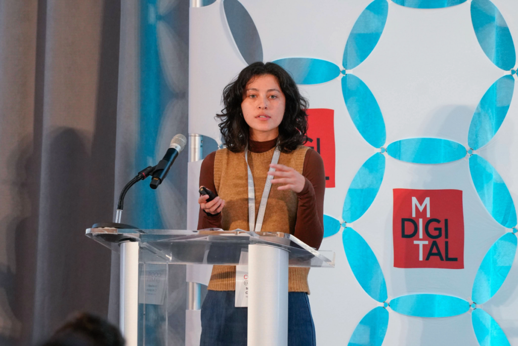 Woman speaking at CODE@MIT